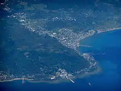 Aerial shot of Pasacao with its port and oil depot.