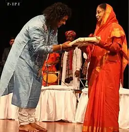 Patri Satish Kumar being honored by the Ex-President of India, Smt. Pratibha Patil