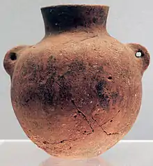 A red pot with two "ears"; by Peiligang culture; 6000–5200 BC; ceramic; Shanghai Museum (Shanghai, China)