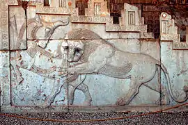 A bas-relief at Persepolis, representing a symbol in Zoroastrianism for Nowruz.