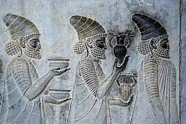 Image 12Detail of a relief on the eastern stairs of the Apadana Palace, Persepolis, depicting Armenian ambassadors, bringing wine to the Persian Emperor. (from History of wine)