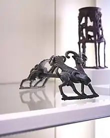 Image 28A Luristan bronze horse bit (from Domestication of the horse)