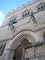 A Griffin and a Lion, symbols of the city, decorate the entrance from Piazza della fontana