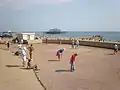 Players of the Brighton & Hove Petanque Club on the Peace Statue Terrain, Brighton & Hove, UK