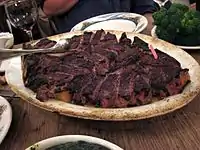 Steak served at Peter Luger