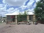 One of the low rent cabins in Beatty's Court on Ruth Street built in the 1930s. Elizabeth Beatty rented the cabins to families suffering from tuberculosis. Beatty was a retired secretary who moved to Sunnyslope in 1918. She inherited land between Ruth St. and Central Ave. where she established the low-rent cabins