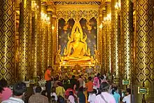 gilded statue of Buddha in Wat Phra Si Rattana Mahathat, Thailand