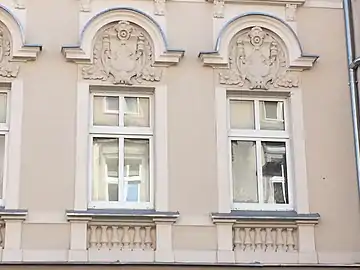 Detail of a window balustrade and pediment