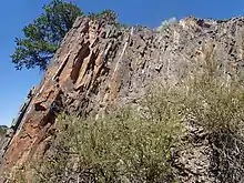 Outcrop of Pilar Formation showing metatuff beds (white layers)