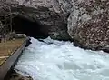 The Unica River emerging from the cave