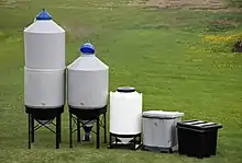 multiple poly grain bins used for farming