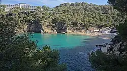 The beach (right) and parador (left)