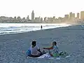 Poniente beach in Benidorm when the sun sets.