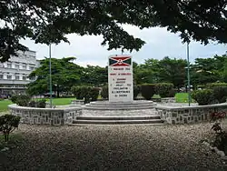 flag sign at flagpole and raised plaza