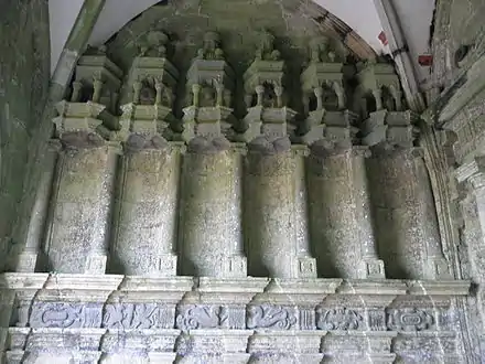 Empty niches in the porch interior