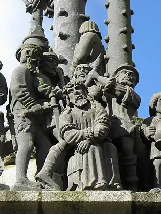 Soldiers manhandle Jesus and force the Crown of thorns down on his head