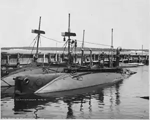 USS Plunger moored beside the USS Shark in 1902
