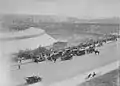 Exterior of the Polo Grounds with Harlem River Speedway in foreground, circa 1915. Note vacant lot, site of Manhattan Field.