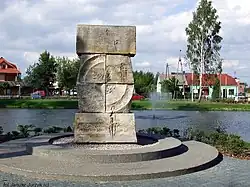 World War II memorial and pond in Pilawa