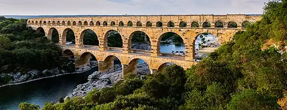 Image 60The Pont du Gard aqueduct, which crosses the river Gardon in southern France, is on UNESCO's list of World Heritage Sites. (from Roman Empire)