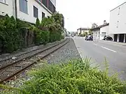 Roadside track approaching the station