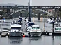 Boats and Barca bridge in the background