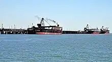 Image 6Cargo ships at the Port of Gladstone, Queensland's largest commodity seaport (from Queensland)