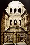 Inner court. The middle stories were converted into two churches by extending the floors over the inner court.