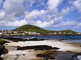 A panoramic vista of the coast of Porto Martins, and the extinct spatter cone Capitão