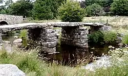 The clapper bridge at Postbridge, which is the central location of Phillpotts' novel The Thief of Virtue.