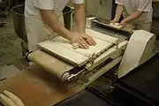 7: The dough is rolled again by hands