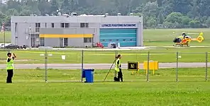 Eurocopter EC135 Lifeguard 9 waiting for an emergency dispatch at the Ławica Airport