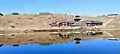 Dry winter view of Prashar Lake and temple