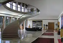 The lobby of the palace and its iconic staircase.