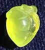 Carved yellow prehnite pendant, 2.4 cm x 1.8 cm, 5.5 grams