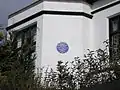 Presbytery with blue plaque of John Hardman