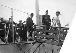 President Harding disembarks from a ship.