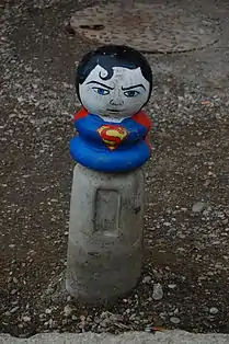 A painted bollard in Pristina