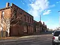 Warehouse that no longer exists which stood just west of the Jack Kerouac Lofts