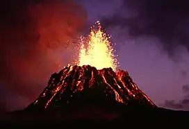 Puʻu ʻŌʻō, a parasitic cinder cone on Kīlauea, lava fountaining at dusk in June 1983, near the start of its eruptive cycle