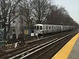 A Coney Island bound Q Train approaches the station