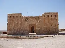 Mosque (front view) after being largely rebuilt, Mihrab is visible in the interior back wall