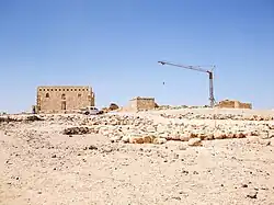 Rebuilt mosque (left) and qasr (right)