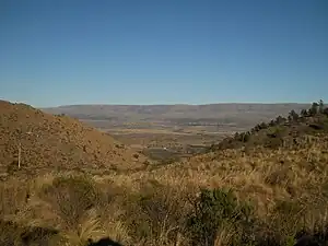 Afar in the center, the quebrada the park is named for