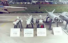 R-73Ae, R-27 R1(AeR1), R-27T1(AeT1) and Kh-59MAe at 1999 MAKS (air show).