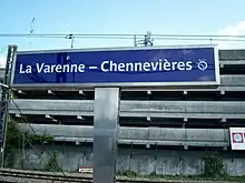 Sign of the name station on a platform