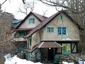 Thunderbird Lodge (kitchen entrance), from the west. The octagonal stair tower is at far left.