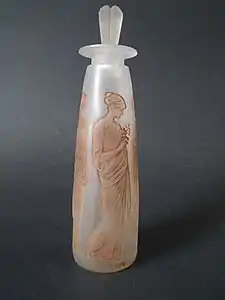 Bottle made by Lalique for Ambre Antique perfume by François Coty (1908)