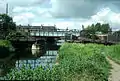 The Sheepwash Channel with the new railway bridge and the old railway swing bridge