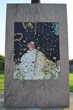 A stone mural marks the spot of his death